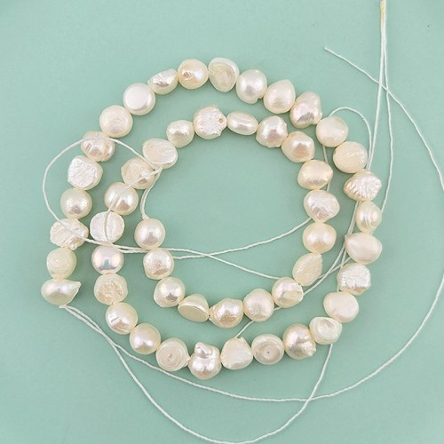 비즈팡 [DP-1-01]담수진주 납작못난이 5-6mm 크림 ,1줄(약32cm미만)